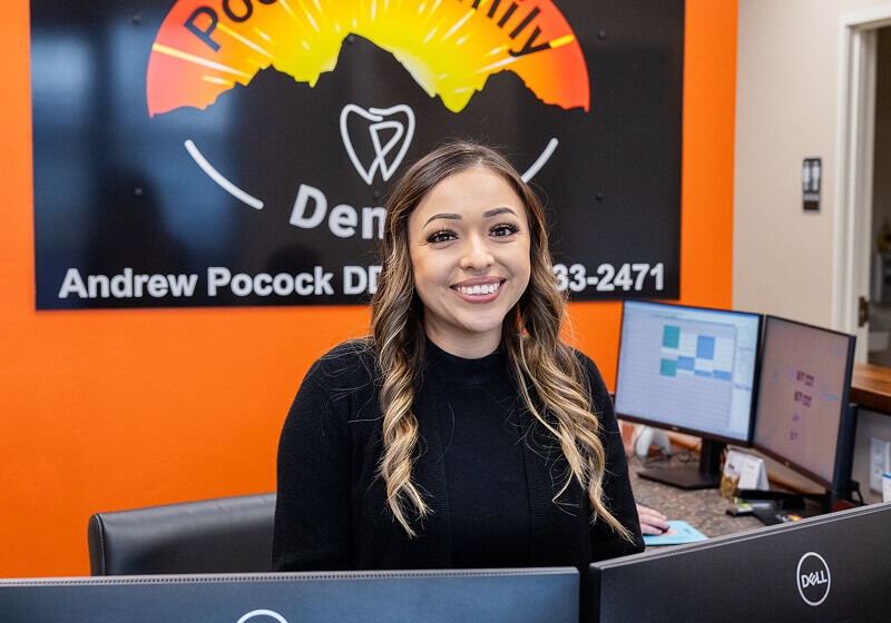 A staff member greeting patients at Pocock Family Dental in Twin Falls ID.