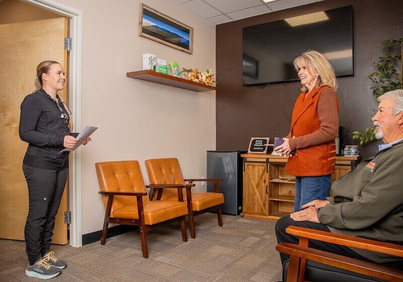 A staff member greeting patients at Pocock Family Dental in Twin Falls ID.